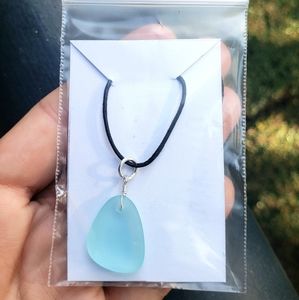 Blue polished seaglass necklace.